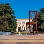Iconic Broken Chair sculpture near UN building in Geneva.